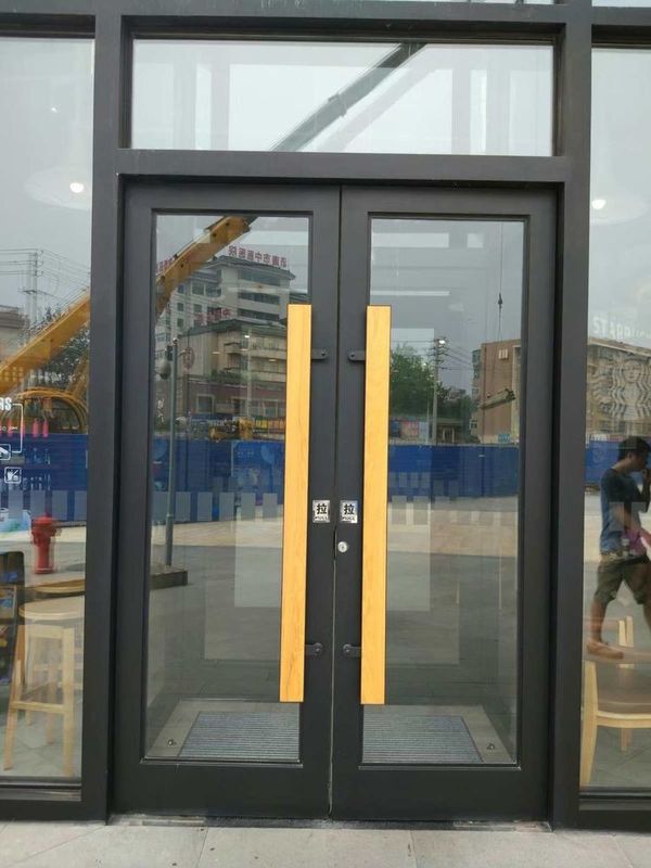 Acero inoxidable aluminio Exterior Doble piso de resorte columpio automático Puertas 72x96 ODM