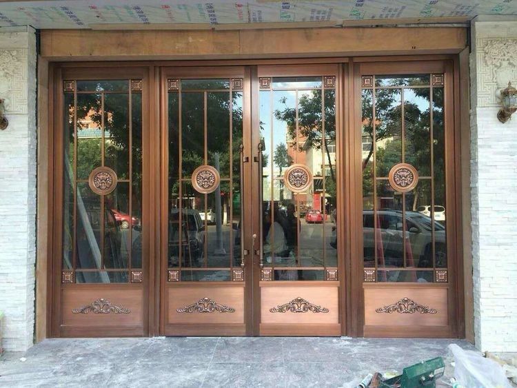 Acero inoxidable aluminio Exterior Doble piso de resorte columpio automático Puertas 72x96 ODM
