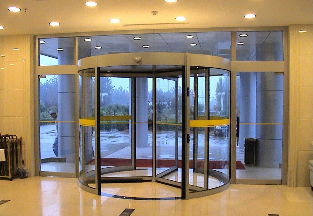 Tamaños estándar y personalizados Puerta giratoria automática con acabado de acero inoxidable