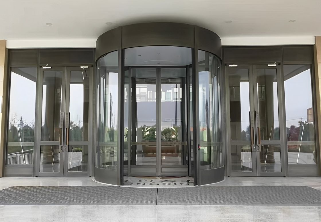 Fabricante Puerta giratoria totalmente automática de inducción automática de vidrio para edificios comerciales de hoteles